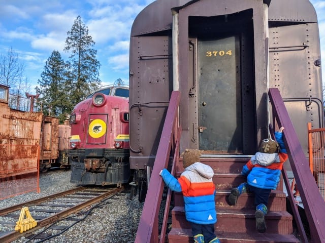 Kids climbing on a train